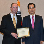 Master Doug Cook Accepts Taekwondo Award from South Korean Ambassador